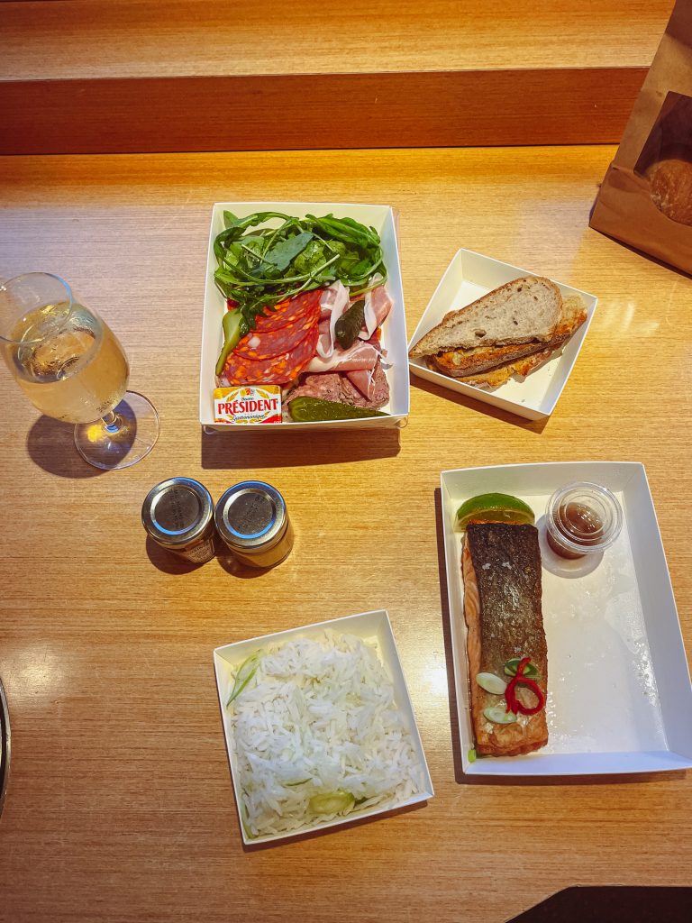 a table with food in containers