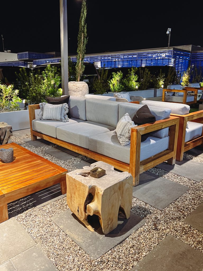 a couches and tables on a patio