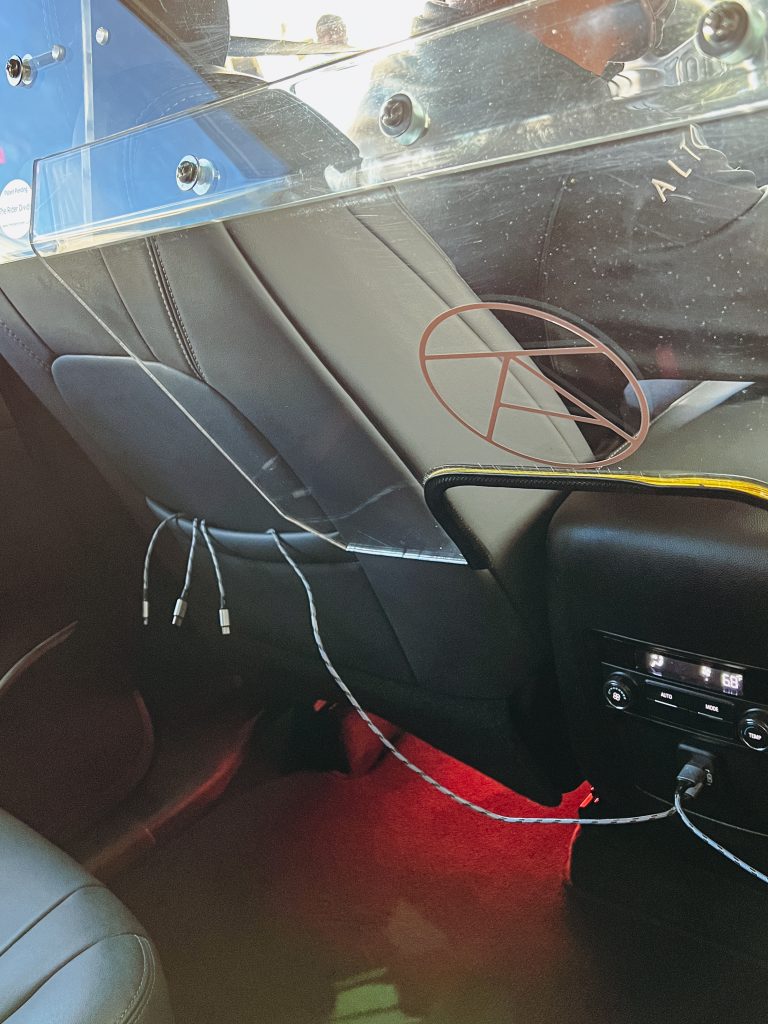 a car with a windshield and wires attached to it