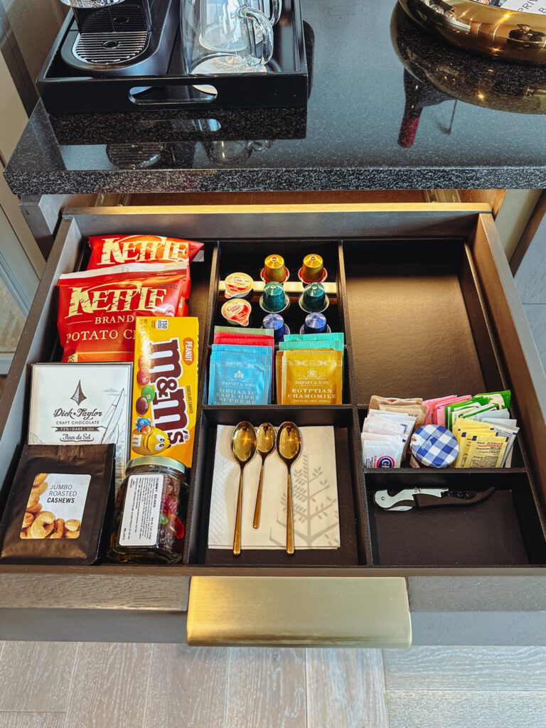 a drawer with food and tea in it