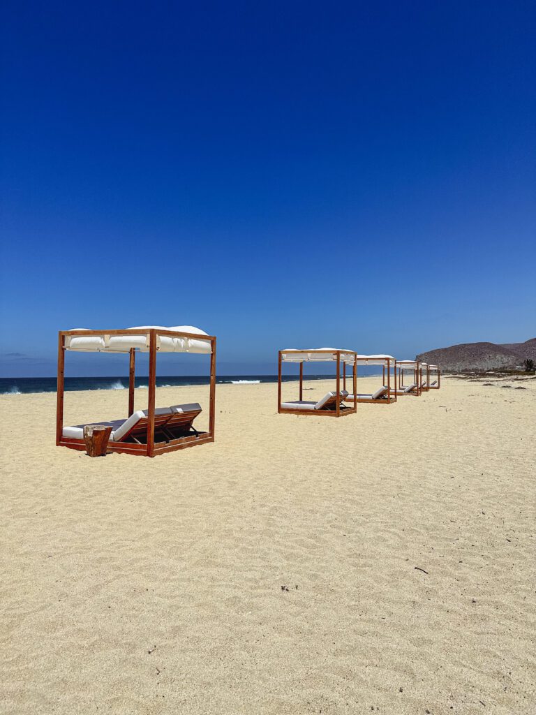 a group of chairs on a beach