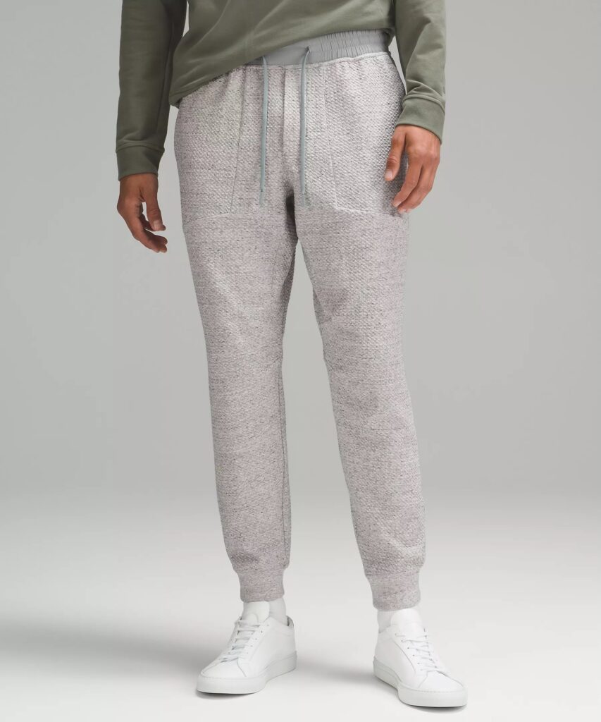 a person wearing grey sweatpants