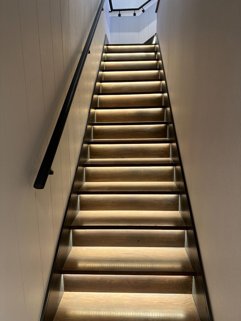 a staircase with lights on